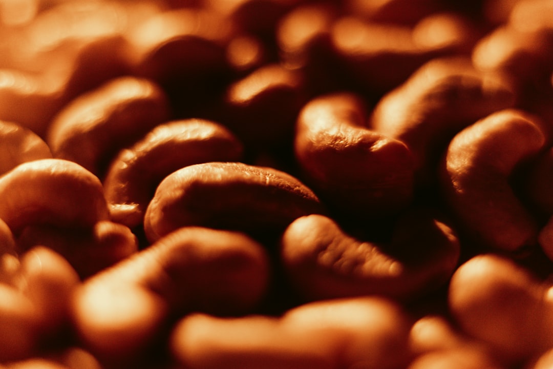 Close-up of roasted Colombian coffee beans with rich dark-chocolate tones